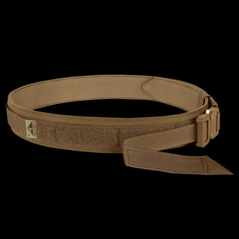 The Condor Cobra Gun Belt is a tan tactical belt with a metal buckle, velcro section, and an attached label featuring a small logo.